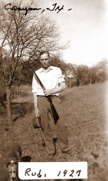 Rudi with rifle in Canyon, 1927